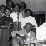 Clarence Wills (holding guitar) as budding band leader