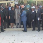 Cheryl in Orange to left after meeting with Senegalese President Wade